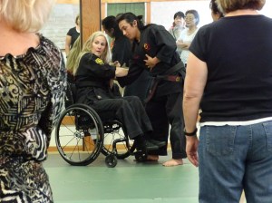 Karen Trolan demonstrates a move that can knock down an assailant.