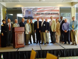 Left to right are Lehua Greenman (Membership Committee Chair), SILVAR President Chris Isaacson, Joe Brown, San Mateo County Supervisor William Slocum, Larry Tringali, Steve Trolan, Supervisor Joe Simitian (who served as auctioneer), Tom Gordon, Bill Weseloh, Mike Frangadakis, Kelly Hutter, Derrick Felton, Bill Moody and Frank Limon.